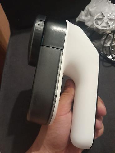 Ostali kućni aparati: Električni aparat za uklanjanje mucica i dlačica sa odeće (lint — 8