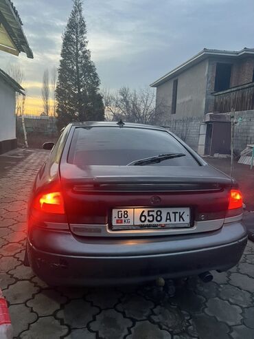 Mazda: Mazda 626: 1994 г., Хэтчбэк — 8