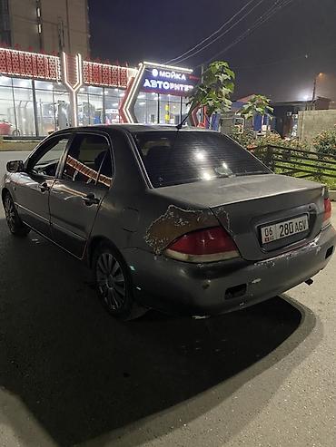 Mitsubishi: Mitsubishi Lancer: 2005 г., 1.6 л, Механика, Бензин, Седан — 4