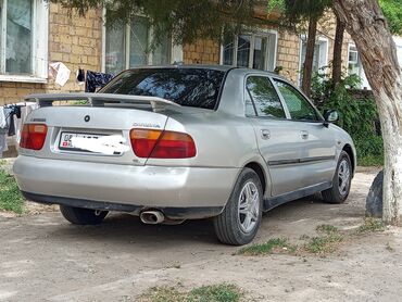 тот самый гольф: Mitsubishi Carisma: 1999 г., 1.6 л, Механика, Бензин, Седан