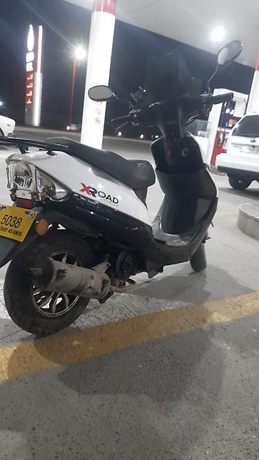 Sürücü-kuryer, stajı 3 il, Moped