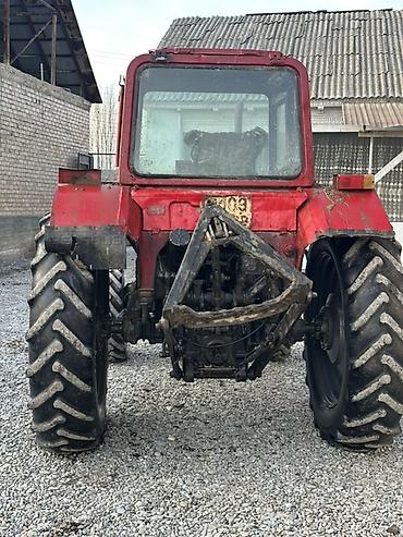 Другие тракторы: Трактор колесный красного цвета с кабиной. Основные характеристики и — 4