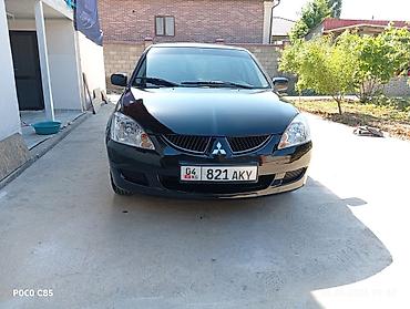 surron light bee: Mitsubishi Lancer: 2004 г., 1.6 л, Механика, Бензин, Универсал — 6
