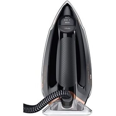 компактная кофемашина для дома: Утюг Tefal черного цвета с медными акцентами, предназначенный для