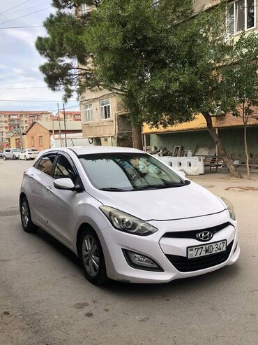 hunday tucson: Hyundai i30: 1.6 l | 2014 il Hetçbek