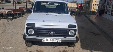 скутер купить бу: VAZ (Lada) Niva 4x4, 3 qapılı, ağ rəng. Xüsusiyyətlər: - Tam