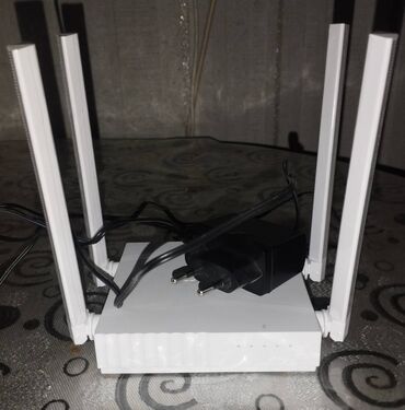 Modemlər və şəbəkə avadanlıqları: 4 girişli, Modem Wi-Fi, router TP-LINK ARCHER C24 AC 750 lalafo.az -da Modemlər və şəbəkə avadanlıqları: 4 girişli, Modem Wi-Fi, router TP-LINK ARCHER C24 AC 750