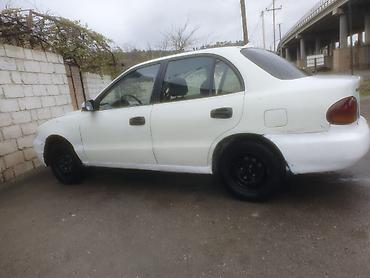 tap az kondisioner: Hyundai Accent: 1.5 l | 1995 il Sedan — 7