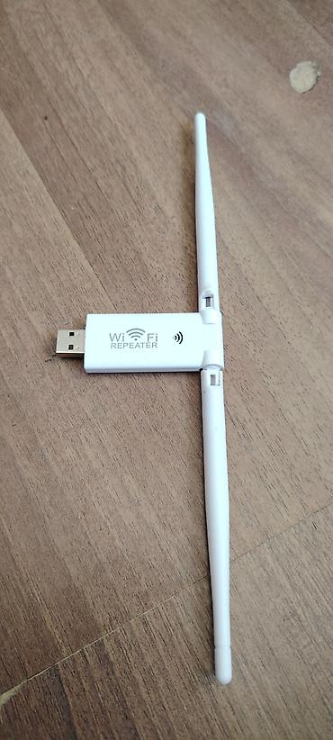 mi repeater: USB Wi‑Fi Repeater (Model: U8) — 4