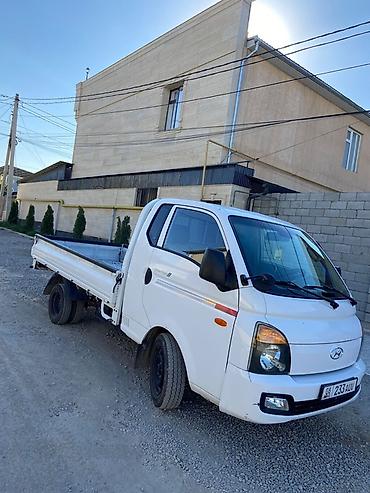 1000: Hyundai Porter II бортовой малотоннажный грузовик - Компоновка — 1