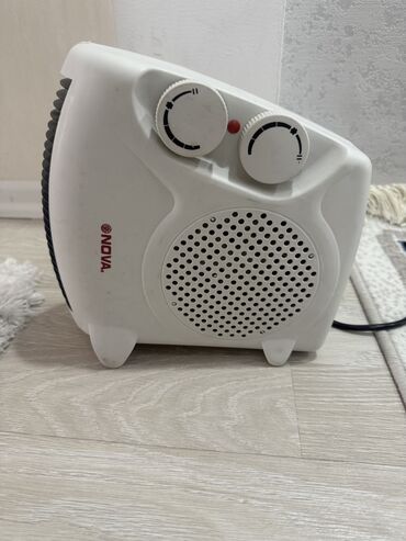 блок питания для сигнализации: Мощность: 1000/2000 W Площадь обогрева: 20 м² горячий воздушный поток