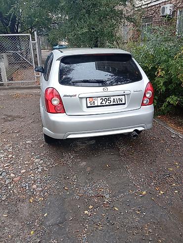 Транспорт: Mazda Protege: 2003 г., 2 л, Автомат, Бензин, Универсал — 3