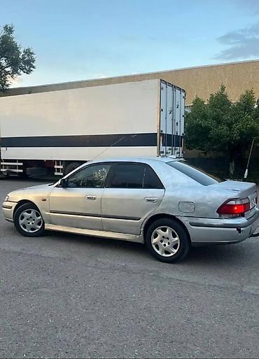 sprinter 315: Mazda Capella: 1999 г., 1.8 л, Механика, Бензин, Седан — 4