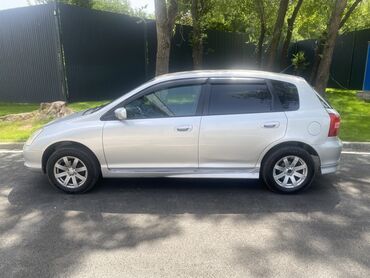 хондо жаз: Серебристый хэтчбек Honda Civic 4WD в кузове 5-дверного типа