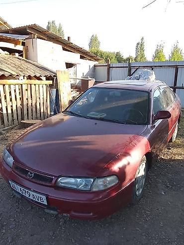 авто маркер: Mazda 626: 1994 г., 1.8 л, Механика, Бензин, Седан — 1