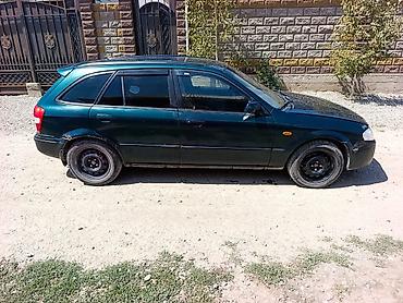 demio sport: Mazda 323: 2000 г., 1.6 л, Механика, Бензин, Лифтбек — 2