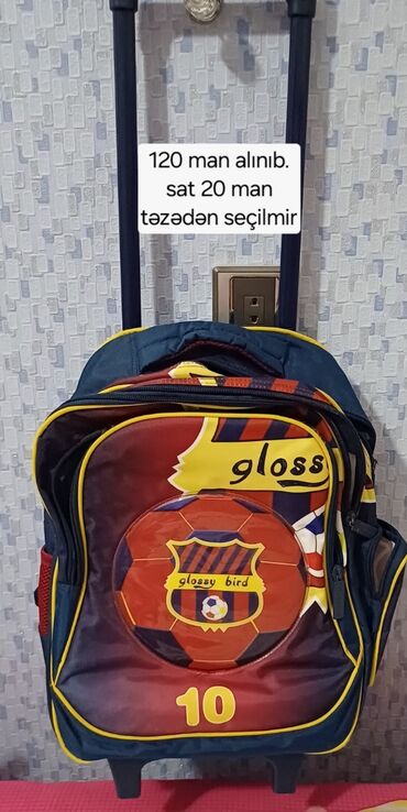 məktəb sumkası: Təkərli uşaq bel çantası parlaq qırmızı, sarı və göy rənglərdə futbol