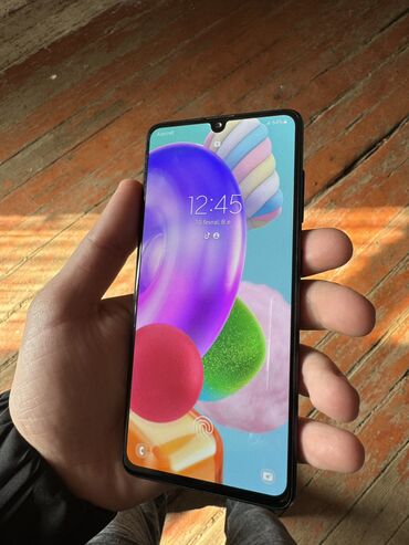 Samsung: Samsung Galaxy A41, 64 GB, rəng - Göy, Barmaq izi, İki sim kartlı, Face ID