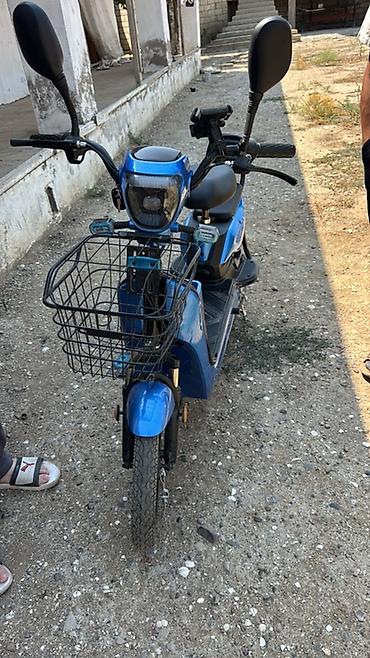 yan guzgulər s: Elektrik skuter – şəhər içi rahat və səssiz hərəkət üçün — 2