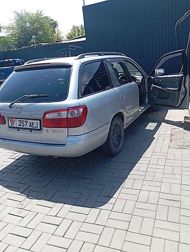 capella: Mazda Capella: 2002 г., 1.8 л, Автомат, Бензин, Универсал — 3