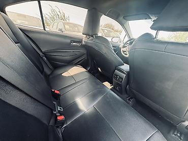 byd e1: Toyota Corolla: 2023 г., 1.8 л, Вариатор, Гибрид, Седан — 10
