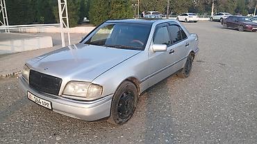 скутер на номерах: Mercedes-Benz C-Class: 1994 г., Механика, Бензин, Седан — 1