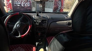 geely monjaro: Nissan Almera: 2000 г., 1.5 л, Механика, Бензин, Хэтчбэк — 4