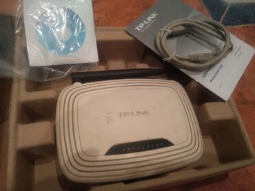adsl tp link modem: Modem TP LINK. Cemi 1 ay islenib. diski, lan kabeli ve kitapcasi