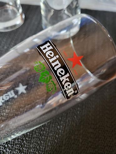 trimer lilly: Case nove,vintaz Heineken za pivo 0,350 L . Case sve na njima odsjaj — 10