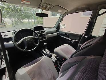 7 nəfərlik avtomobillər: Mitsubishi Pajero: 1.8 l | 1998 il 350000 km Ofrouder/SUV — 5