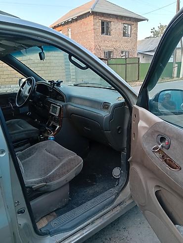 lider auto: Kia Carnival: 1998 г., Минивэн — 6