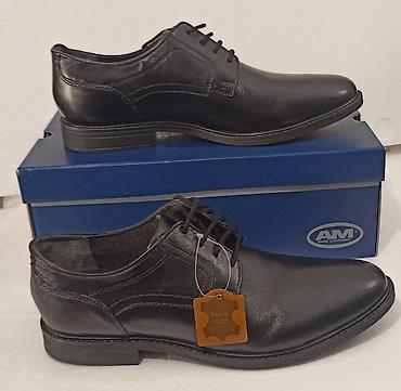 Cipele: Kožne crne cipele – broj 43,Cena: 4990 din (naznačeno na slici). - — 4