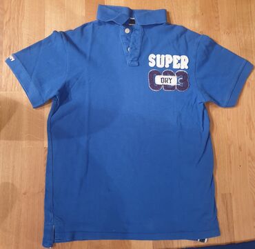 icon majice: SuperDry, super dry plava polo majica sa kragnicom. Piše XL velicina