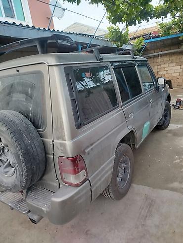 Digər avtomobillər: Off-road tipli 7 yerlik SUV - Kuzov: 5 qapılı, tavan relsləri və yan — 2