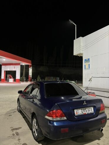 я ищу лада приора: Седан Mitsubishi Lancer девятого поколения, представленный в