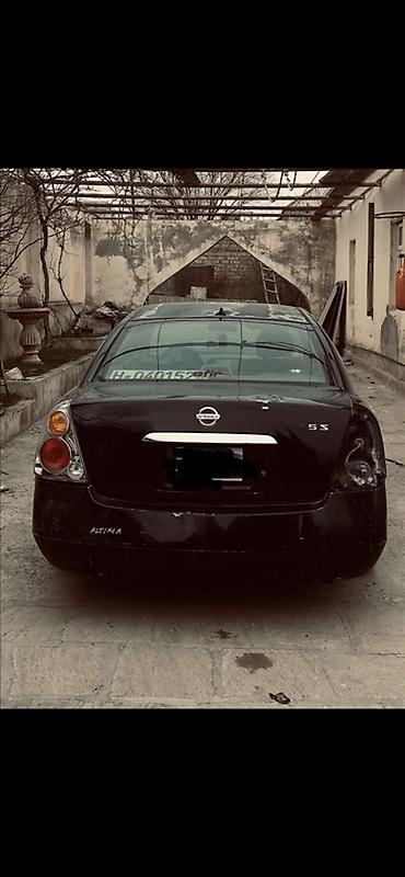 accent 2005: Nissan Altima: 2.5 l | 2005 il Sedan — 3