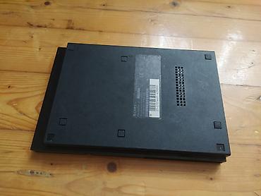oyun barmaqlığı: Sony PlayStation 2 Slim (SCPH-7xxxx seriyası) Paket məzmunu: - PS2 — 2