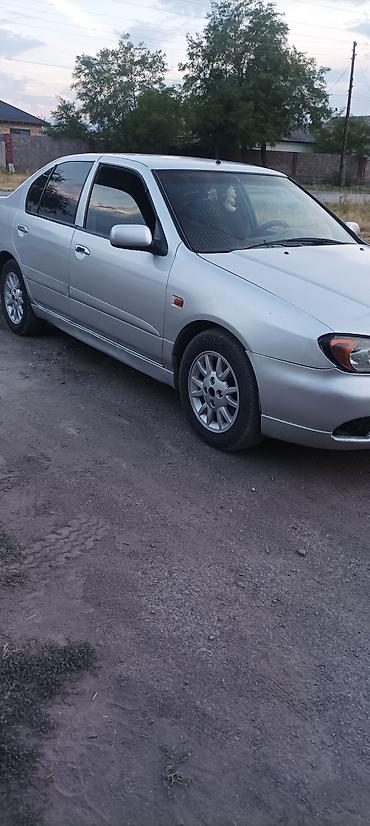 bcd com: Nissan Primera: 2001 г., Седан — 6