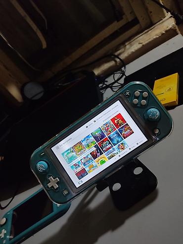 Видеоигры и приставки: Nintendo switch lite чипованный(прошитый) внутренняя память 33гб+64гб — 3