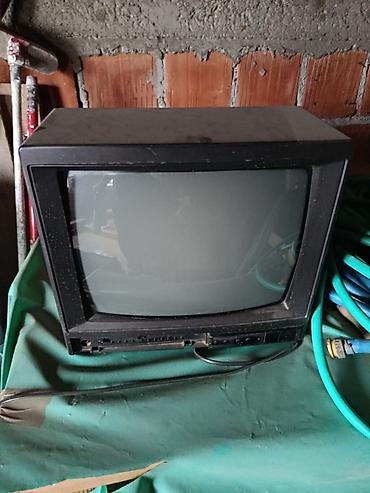 clase 406 cd: CRT TV prijemnik (katodna cev), kompaktan model približno 14–15 inča — 1