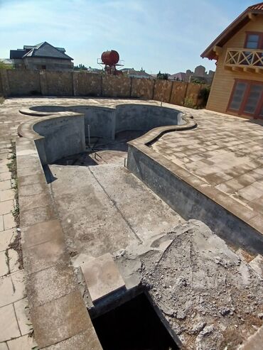 Həyət evləri və villaların satışı: Taxta konstruksiyalı ikimərtəbəli ev və geniş həyət sahəsi. Maştağa — 7