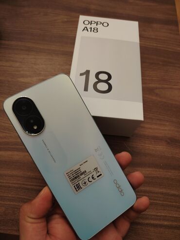 телефон fly champ: Oppo A18, 128 GB, rəng - Göy, Zəmanət, Barmaq izi, İki sim kartlı