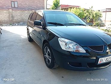surron light bee: Mitsubishi Lancer: 2004 г., 1.6 л, Механика, Бензин, Универсал — 2