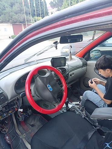 4 qapi niva: LADA Kalina sedan – qırmızı rəng hec bir xerc təlb etmir otur sur — 4