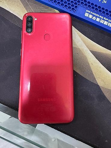 gou pro: Смартфон Samsung а11 (серия Galaxy A) в красном цвете. Ключевые — 1