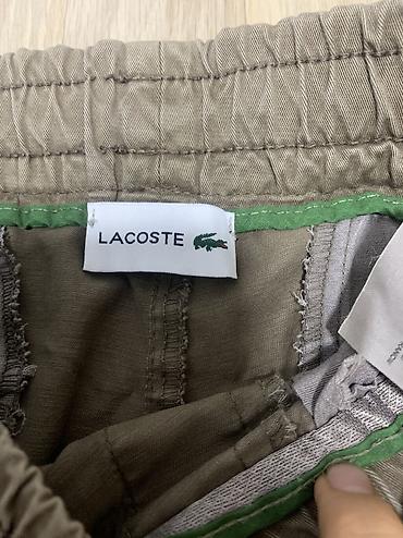 lining s: Мужские брюки Lacoste Подойдет для роста 170-175 - Модель — 2