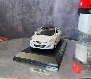 Avtomobil modelləri: Коллекционная модель Hyundai i30 5 door white 2012 Pino B&D Scale — 12