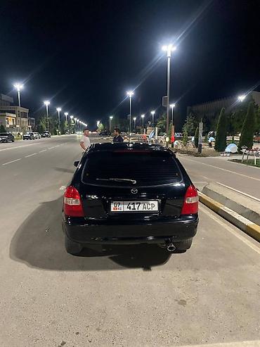 наклейки бмв: Mazda 323: 1999 г., 1.5 л, Механика, Бензин, Универсал — 6