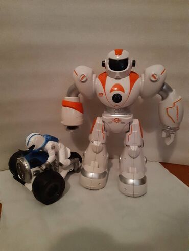 oyuncaq robot: Робот ходит говорит. Мотоцикл музыкальный едет песни поет