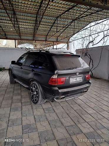 for x5 magic: BMW X5 (E53) – mat qara rəngli, şəhər və off-road üçün rahat SUV — 1